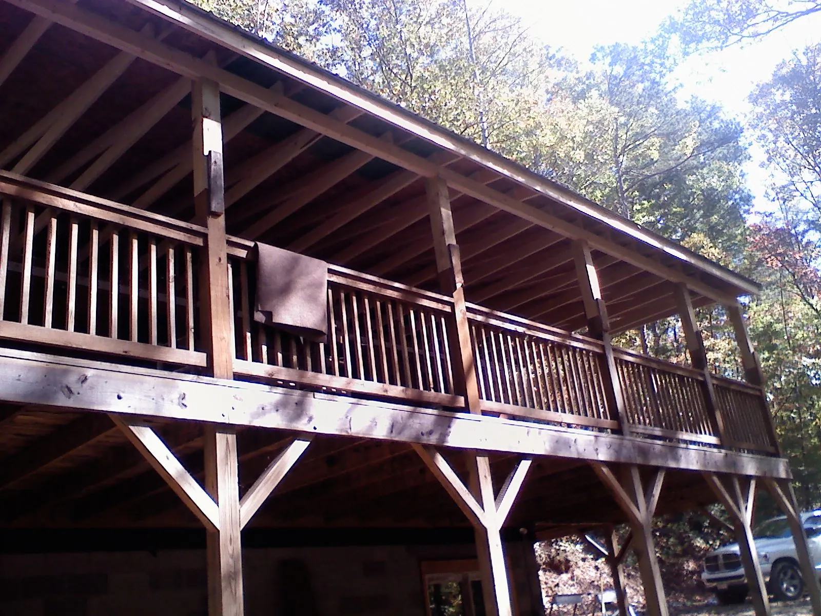Timber framing under a new elevated porch and deck — Roof Leak Repair in North Oxford by Roofing Brothers